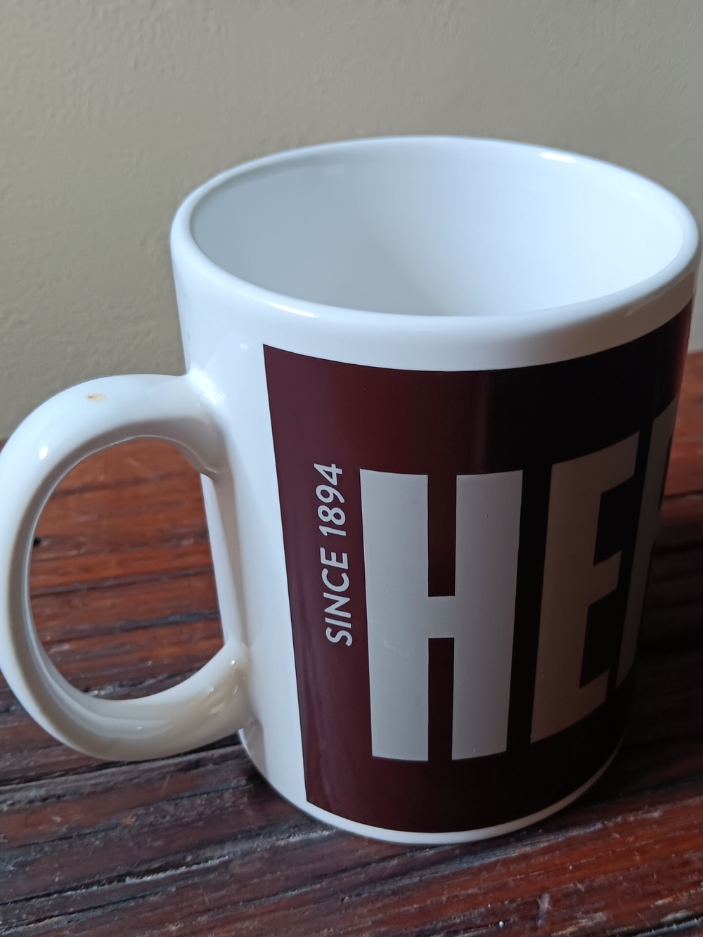 HERITAGE Since 1894 White Ceramic Coffee Mug - Brown Accent